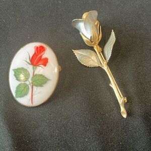 2 rose brooches